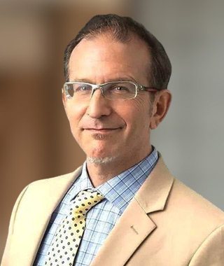 Portrait of Dr. Blake Ohlson, board-certified orthopedic surgeon