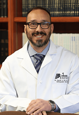 David J. De la Garza, M.D
