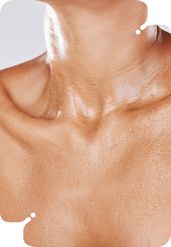 Woman's neck on a white backdrop, showcasing Collagen Renewal Décolleté.
