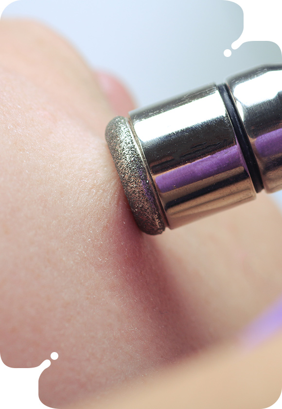 A woman's butt with a water droplet, showcasing the results of a Booty Facial for hydration.