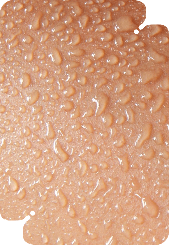 Close-up of a water droplet on skin during a vajacial.