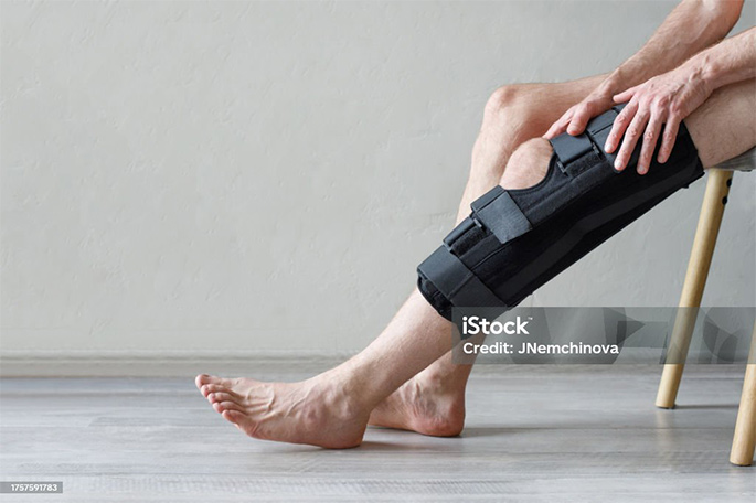 Pictrure of Closeup Of Knee Brace To Patient Leg