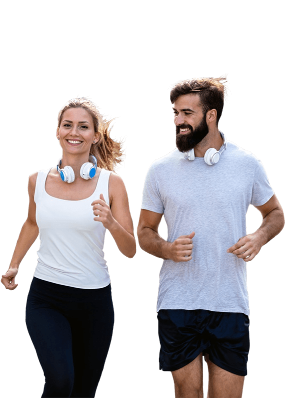 Two people jogging with headphones, showcasing exercise and enjoyment of music.